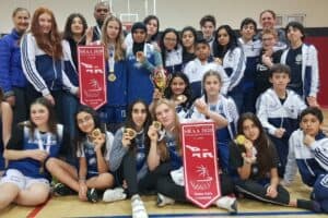 Laura Daukantaite with her team