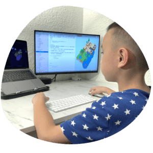 Child at a computer | A balanced approach to technology | Oak Meadow 